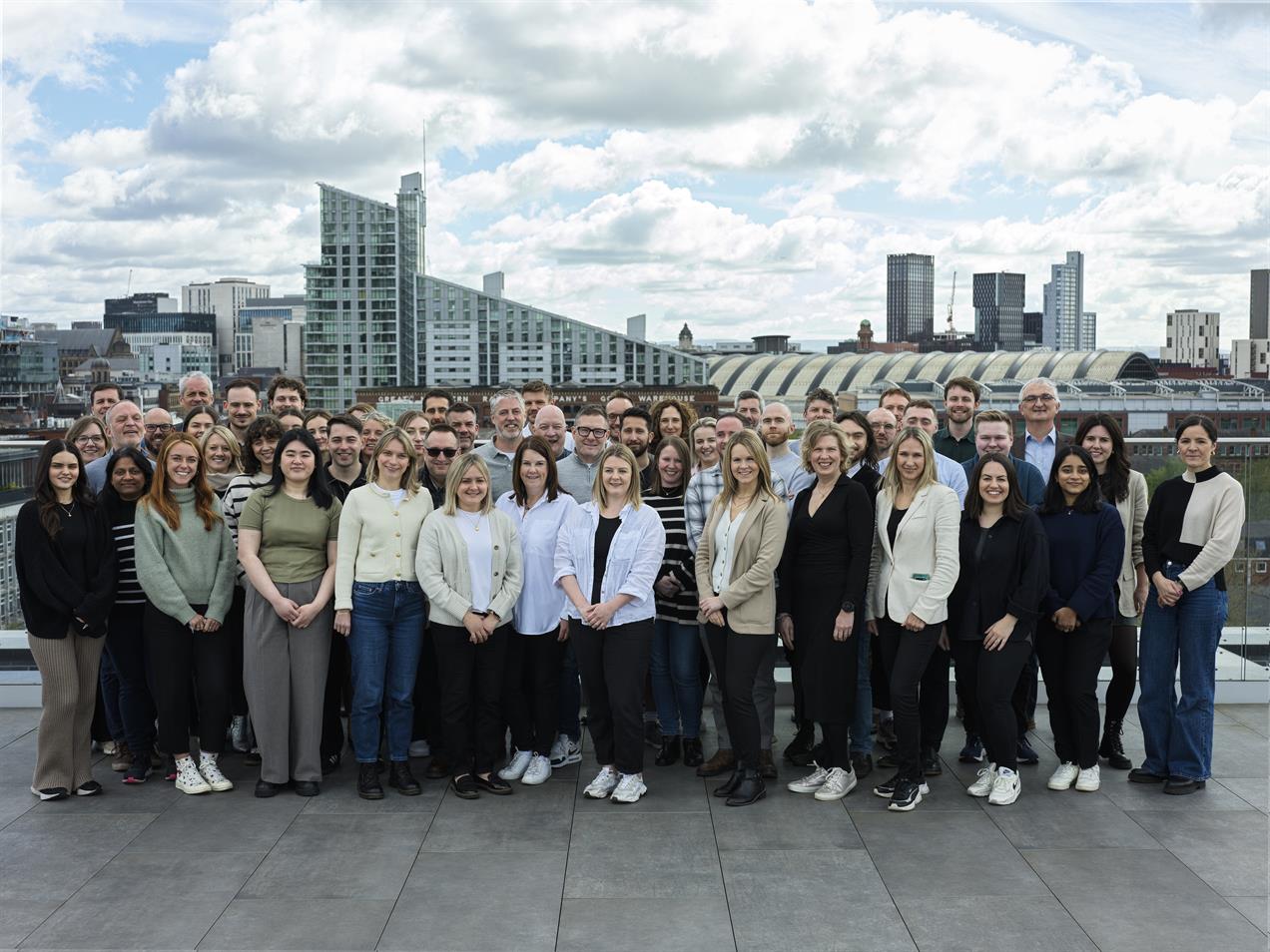 The team, on a Manchester rooftop